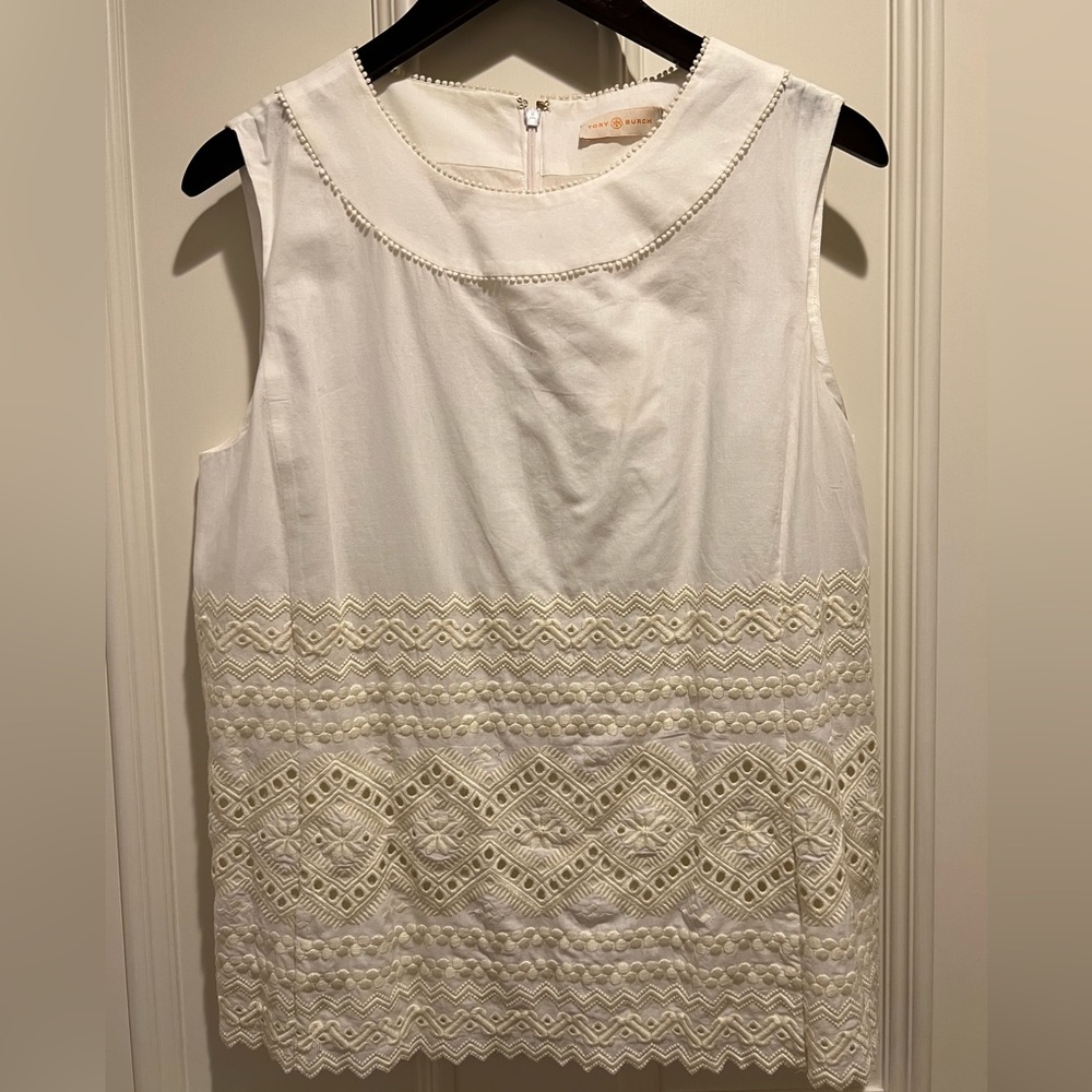 Tory Burch sleeveless white top with crochet detail.